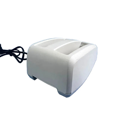 White plastic two-slot toaster with black power cord for bladderscan battery charger reuse medical applications