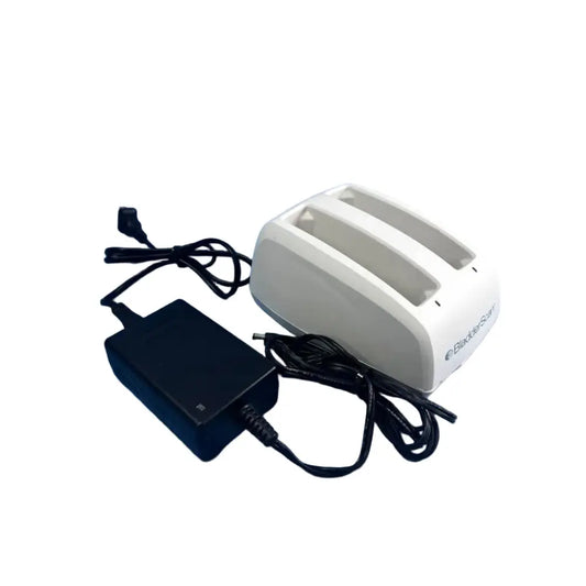 White plastic bladescan dual-slot battery charger with black power adapter and cords for bladderscan battery charging