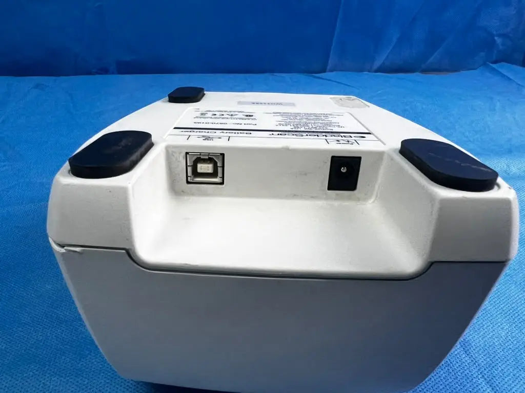 White and gray desktop thermal printer for bladderscan battery charger 0570-0193 with usb port and power input