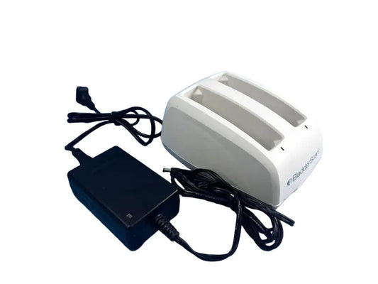 White plastic bladescan dual-slot battery charger with black power adapter and cords for bladderscan battery charging