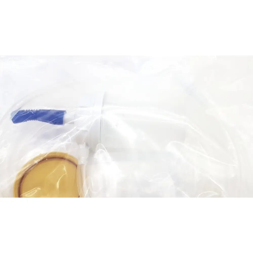 A clear plastic bag containing Boston Scientific M0068402980 stone catcher with blue handle and yellow circular component
