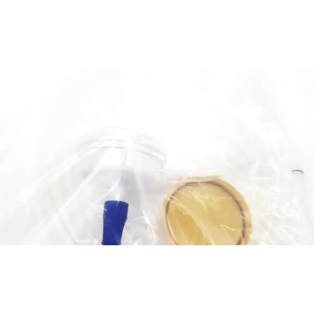Clear plastic boston scientific m0068402980 stone catcher bottle with blue cap and yellow circular component for lithoclast use