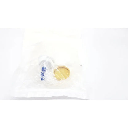 Gold-colored bottle cap with blue and white label under plastic wrapping for boston scientific m0068402980 stone catcher