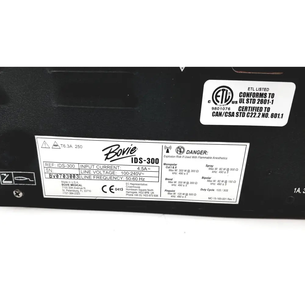 Black bovie ids-300 electrosurgical generator label with white text and certification markings on medical device