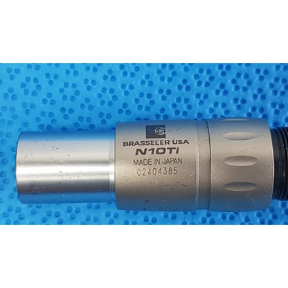 Silver metallic brasseler n10ti led coupler with engraved branding and textured grip for dental handpiece connection unit