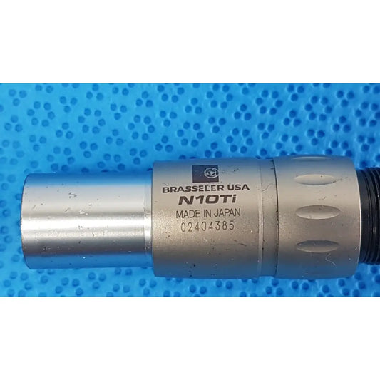 Silver metallic brasseler n10ti led coupler with engraved branding and textured grip for dental handpiece connection unit