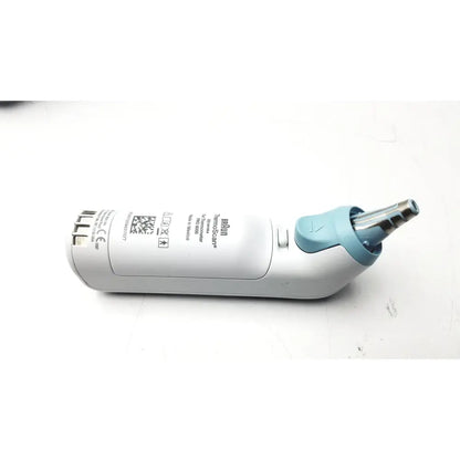 White and light blue braun thermoscan pro 6000 ear thermometer ref 901054 with sleek ergonomic design and charging bay