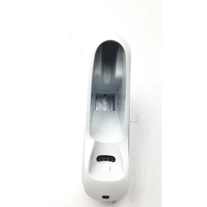 White plastic car phone mount with sleek curved design and black rubberized grips shown with braun thermoscan pro 6000 ear thermometer ref charging bay