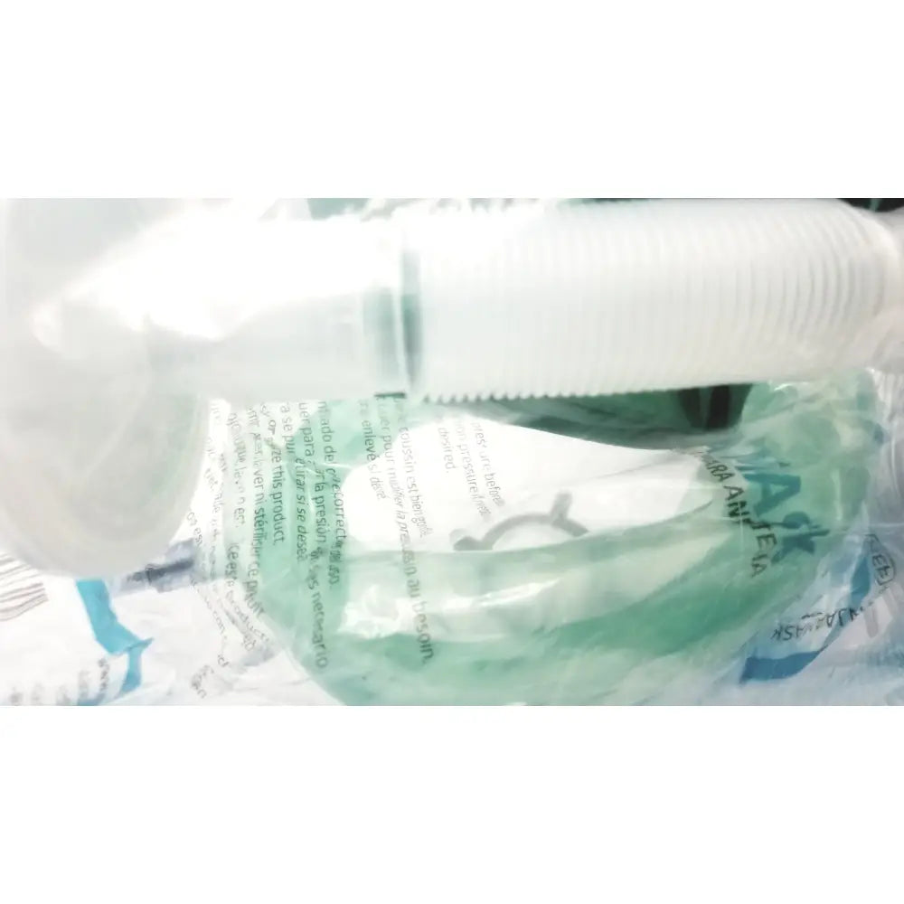 White plastic medical tubing with ribbed texture and printed text for breathing bag coaxial breathing circuit