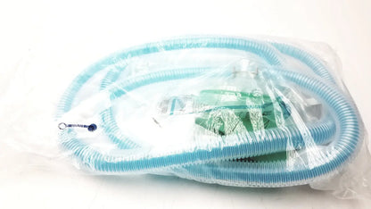 Light blue corrugated plastic hose wrapped in clear packaging for breathing bag coaxial breathing circuit use