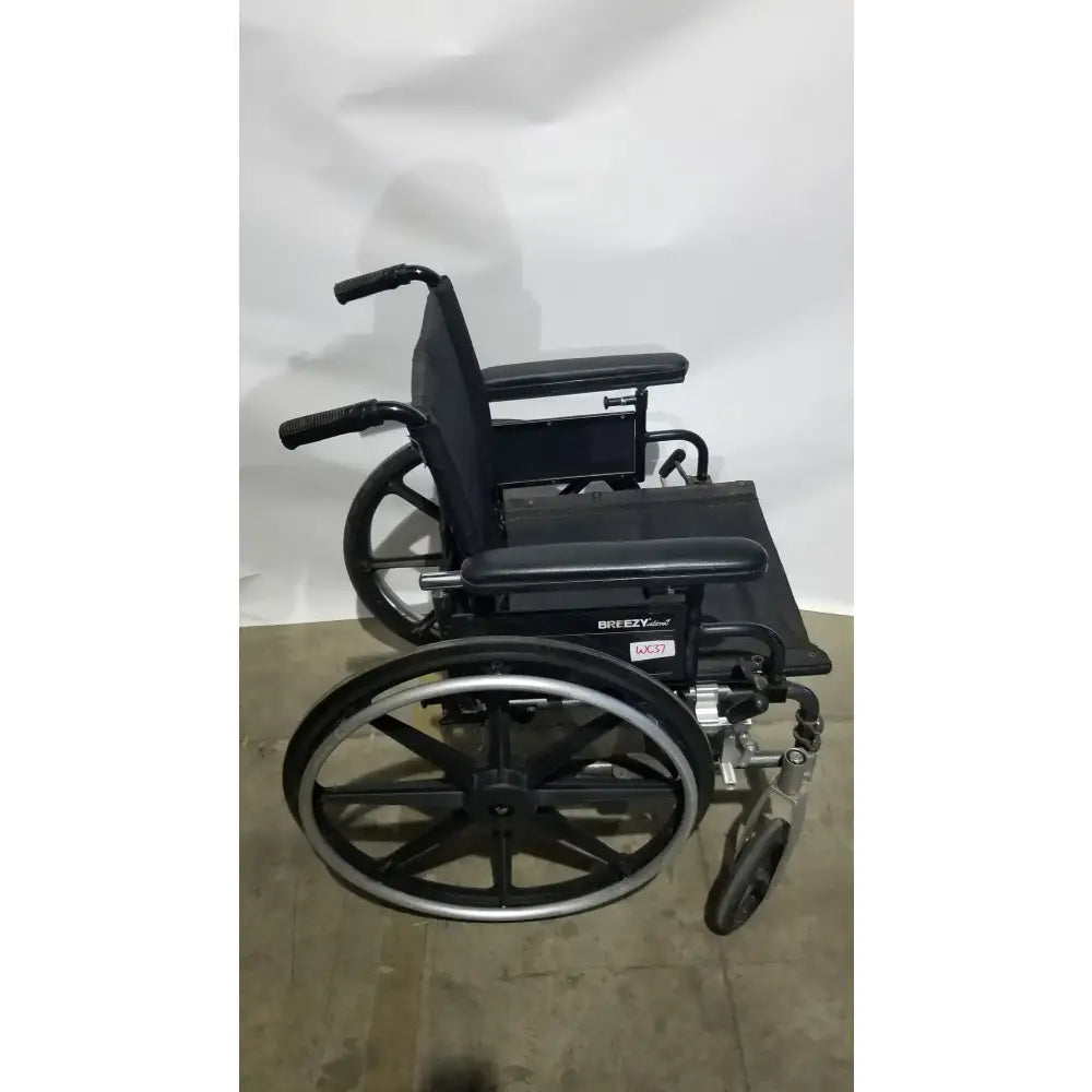 Reuse Medical Equipment Breezy Folding Manual Wheelchair - Lightweight Black Padded Comfort Seat Wheelchairs, second-hand product photo 1