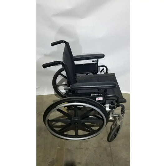 Reuse Medical Equipment Breezy Folding Manual Wheelchair - Lightweight Black Padded Comfort Seat Wheelchairs, second-hand product photo 1