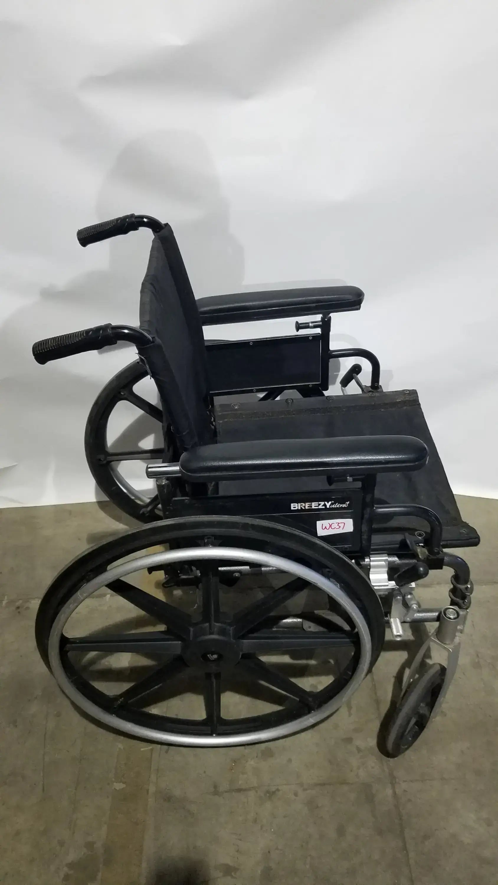 Reuse Medical Equipment Breezy Folding Manual Wheelchair - Lightweight Black Padded Comfort Seat Wheelchairs, second-hand product photo 1