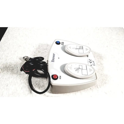 White plastic brewer high low power foot pedal control panel with blue start and red stop buttons for low power exam use