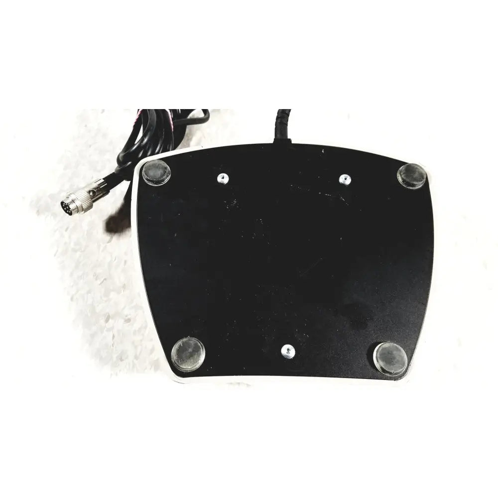 Brewer high low power exam foot pedal black rectangular with silver screws clear rubber feet and metallic connector cable