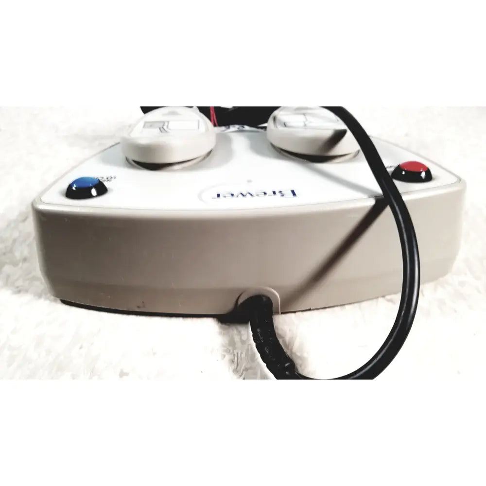 White plastic brewster high low power steam cleaner with two knobs and blue and red buttons for low power exam use