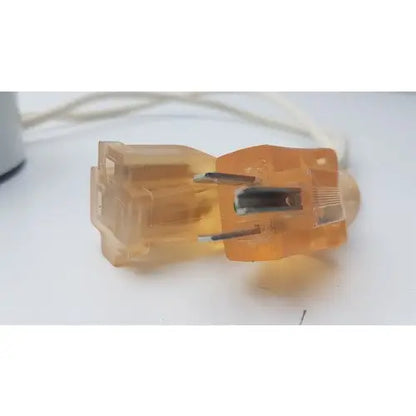 Transparent orange plastic plug with metal prongs for bridegeport magnetics tortran ip600 reuse medical use