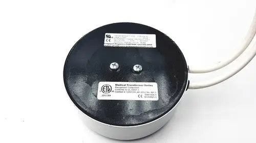 Black and silver bridegeport magnetics tortran tis1000-600watt-1120 medical transformer with two white wires