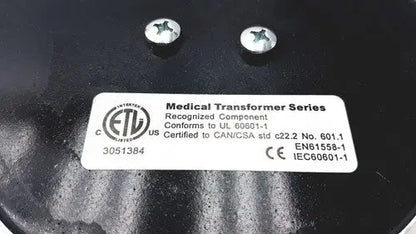 Black medical transformer bridegeport magnetics tortran tis1000-600watt-1120 with white label showing certification marks