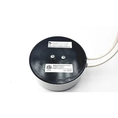Black and silver bridegeport magnetics tortran tis1000-600watt-1120 medical transformer with two white wires