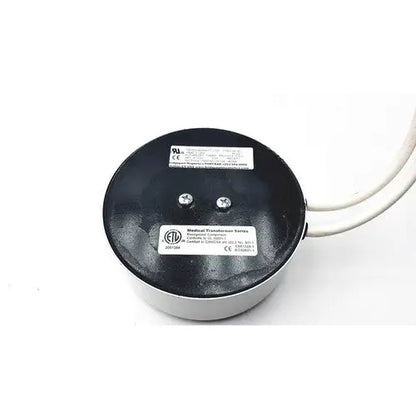 Black and silver bridegeport magnetics tortran tis1000-600watt-1120 medical transformer with two white wires