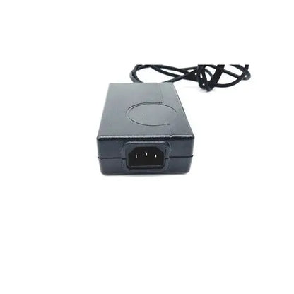 Black plastic power adapter with coiled cable for bridgepower corp bpm050s12f02 medical power supply unit