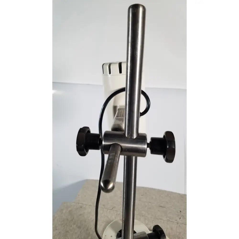 Stainless steel microscope stand with black adjustment knobs and central handle for brinkmann kinematica homogenizer mixer
