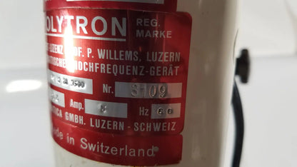 Red label on cream-colored brinkmann kinematica homogenizer mixer polytron high-frequency device made in switzerland