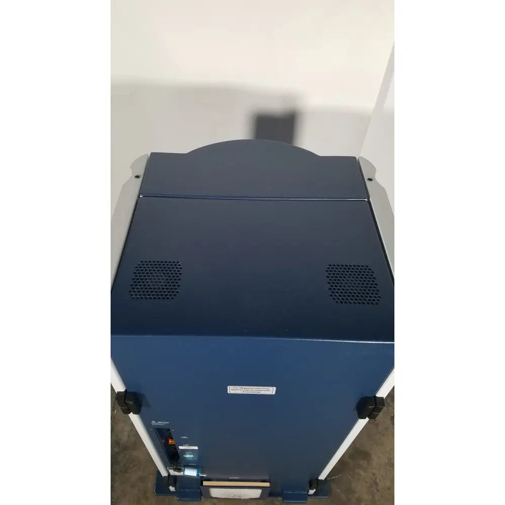 Blue bruker microflex mass spectrometer with matte finish and silver accents featuring top ventilation grilles for reuse medical labs
