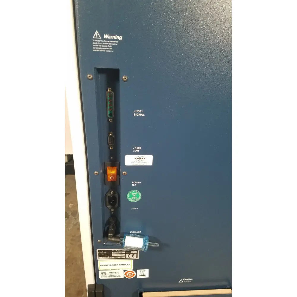 Blue industrial machine panel with ports and switches on the back of bruker microflex lt sh mass spectrometer for reuse medical analysis