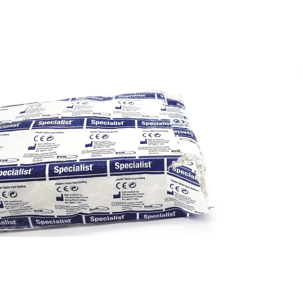 A white and blue fast-setting plaster splint packaged by bsn medical specialist plaster bandage