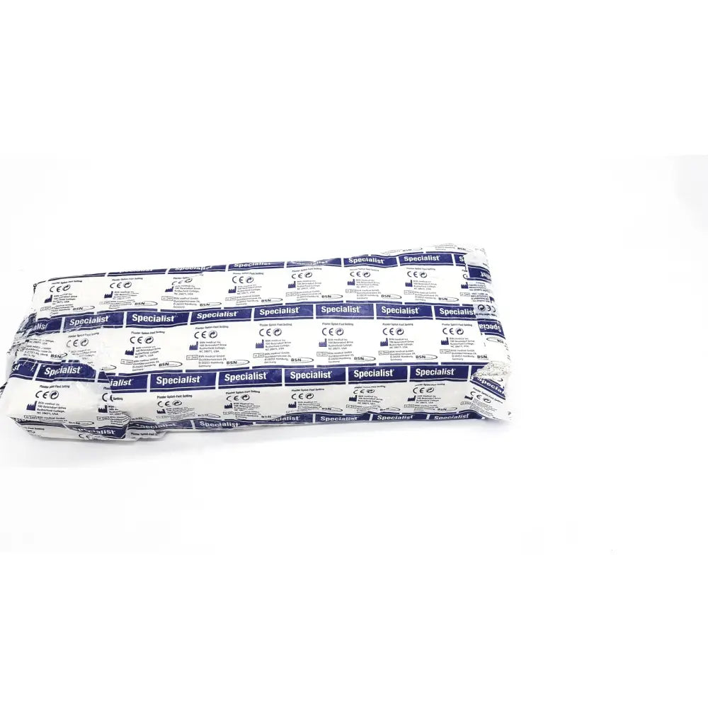 A roll of white and blue patterned bsn medical specialist plaster bandage fast setting in branded packaging