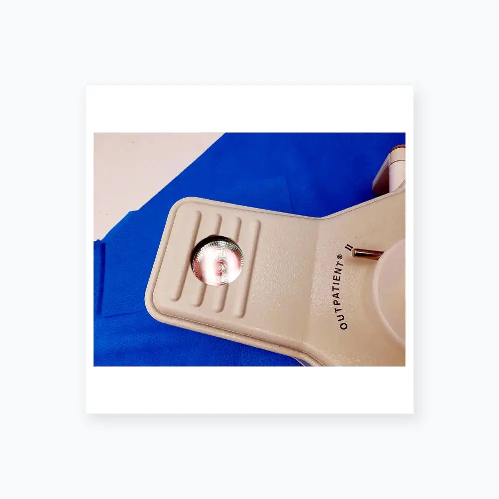 White plastic outpatient ii slit lamp with circular reflective lens for medical equipment by smiths medical reuse medical equipment