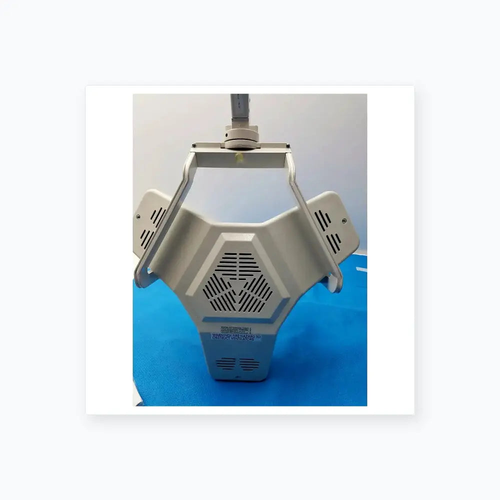 White plastic burton medical outpatient II medical equipment light with hexagonal vented design and adjustable arm wall mount