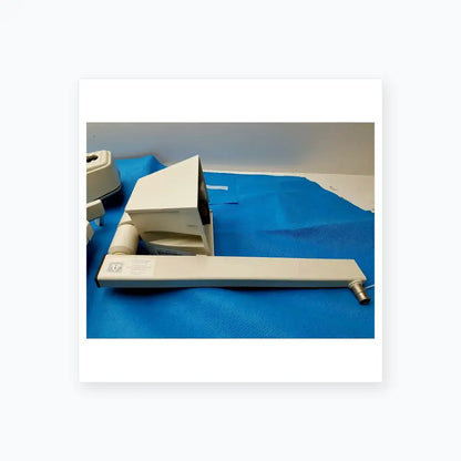 White plastic rectangular housing medical equipment with cylindrical attachment from smiths medical for reuse medical equipment