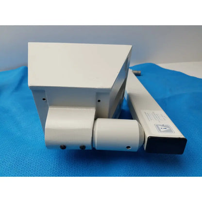 White plastic housing with internal wiring and open side panel of burton medical outpatient ii coolspot ii examination light medical equipment