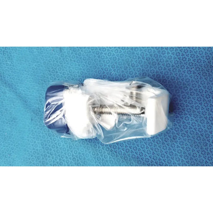 Blue and white plastic surgical stapler wrapped in clear packaging for burton ultraviolet examining light use