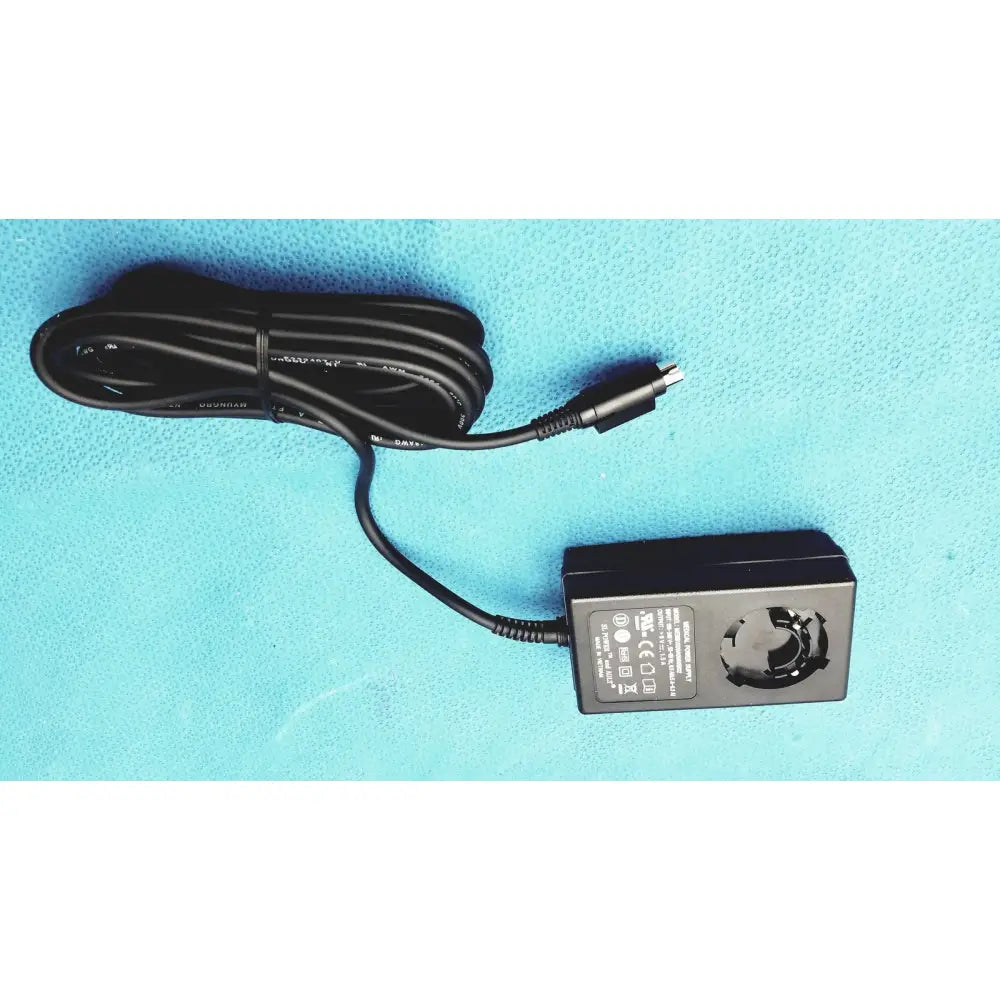 Black rectangular power adapter with coiled cable for burton ultraviolet examining ultraviolet examining light 031980