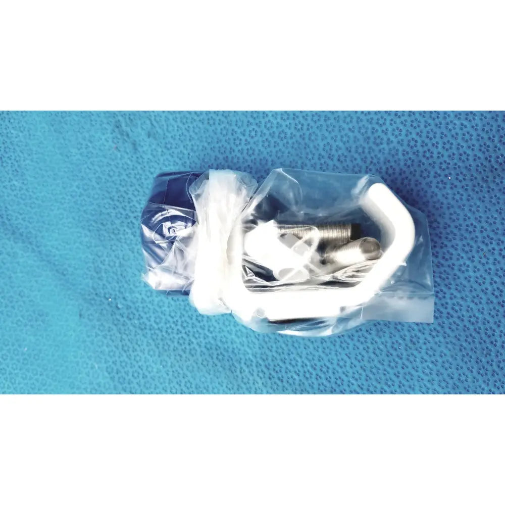White plastic hook and metal screws in clear packaging for burton ultraviolet examining ultraviolet examining light 031980