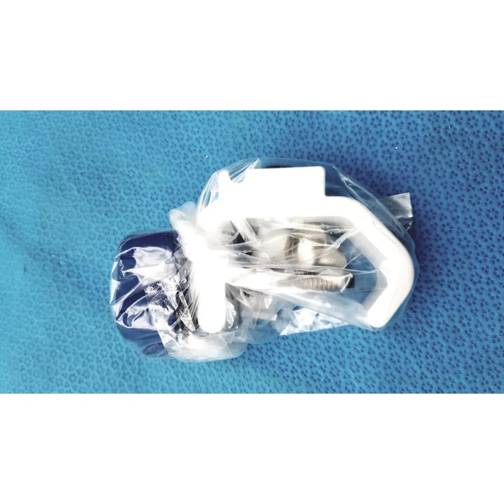 White plastic hook and silver metal screws in clear packaging for burton ultraviolet examining ultraviolet examining light