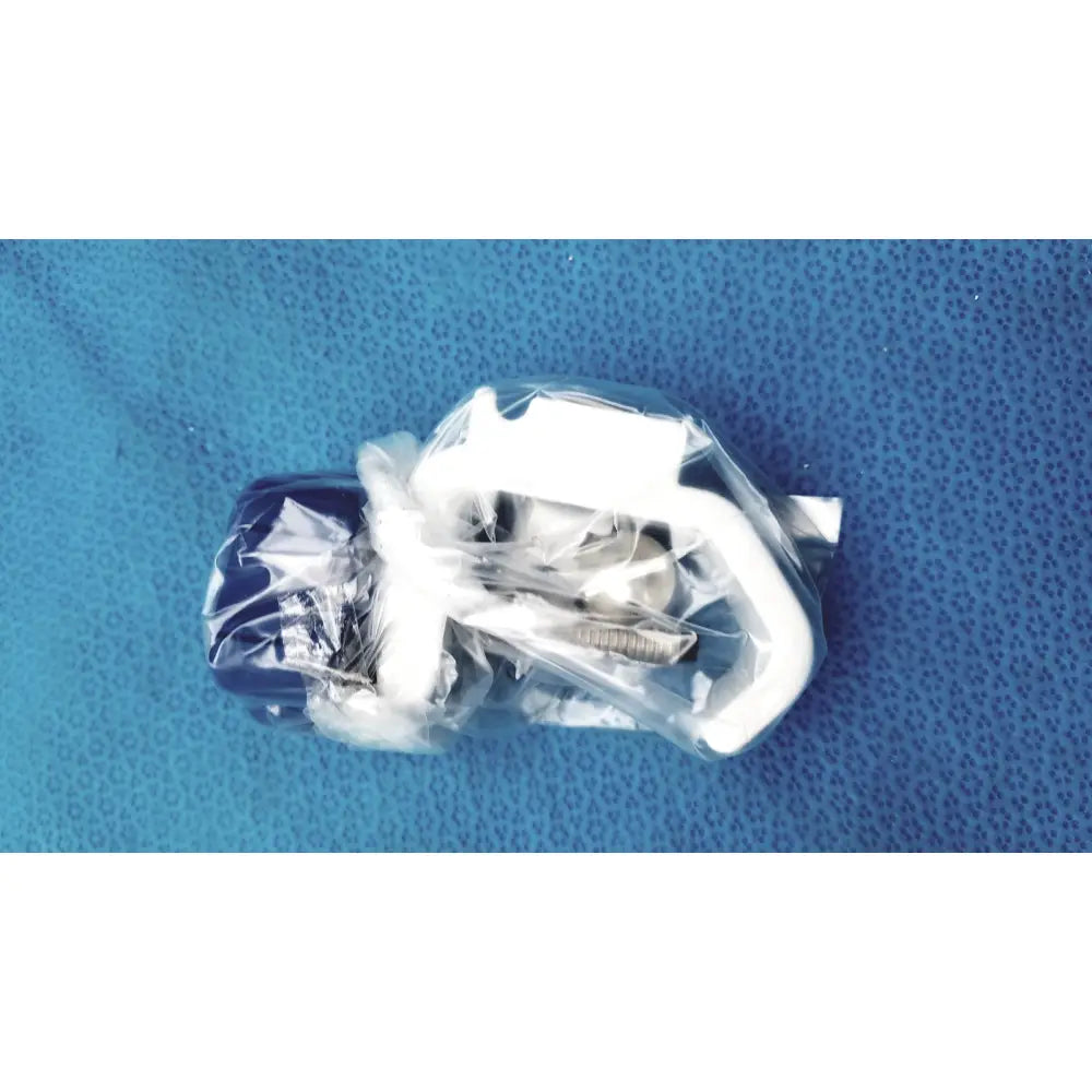 Blue and white plastic door handle assembly wrapped in clear packaging for burton ultraviolet examining light 031980