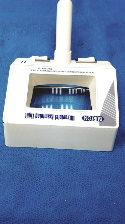 Burton ultraviolet examining light 31601 with white vertical handle and rectangular window showing blue uv light strips