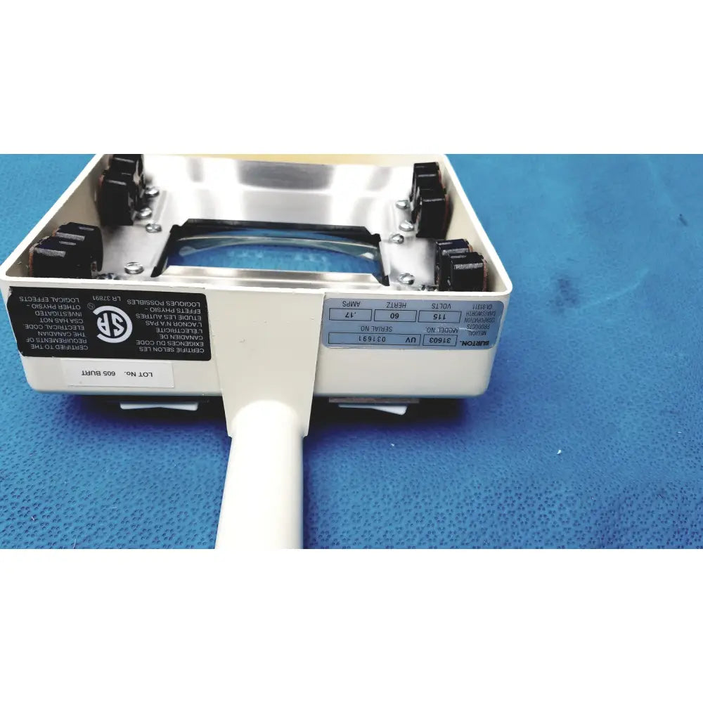 White handheld burton ultraviolet examining light with black rubber grips and clear lens model 37605 by sylvania