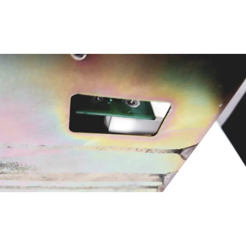 Green circuit board with two silver screws inside a metallic casing of bystronic amplifier cno2 25a 3000 rpm
