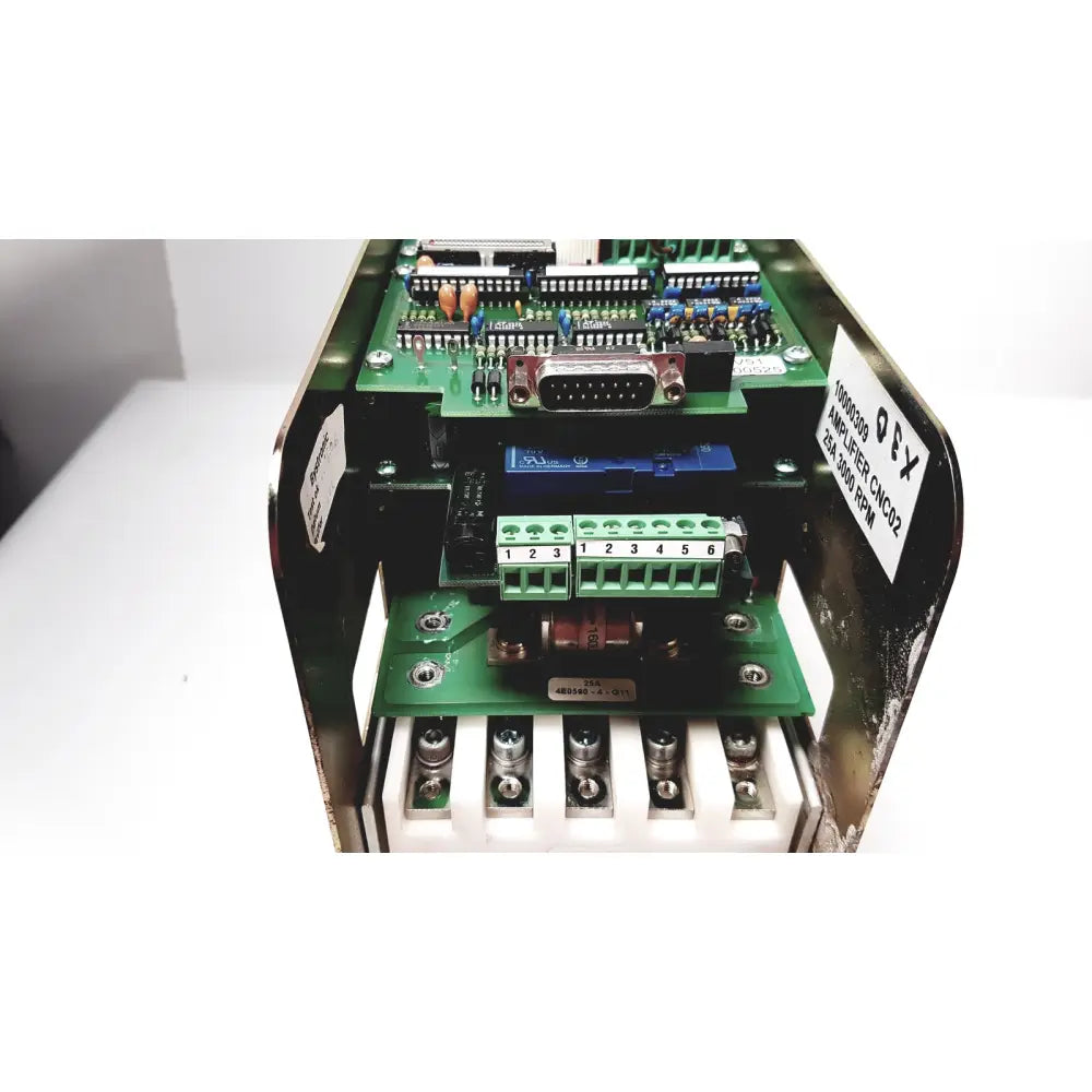 Green circuit board with electronic components inside metallic housing of bystronic amplifier cno2 25a 3000 rpm