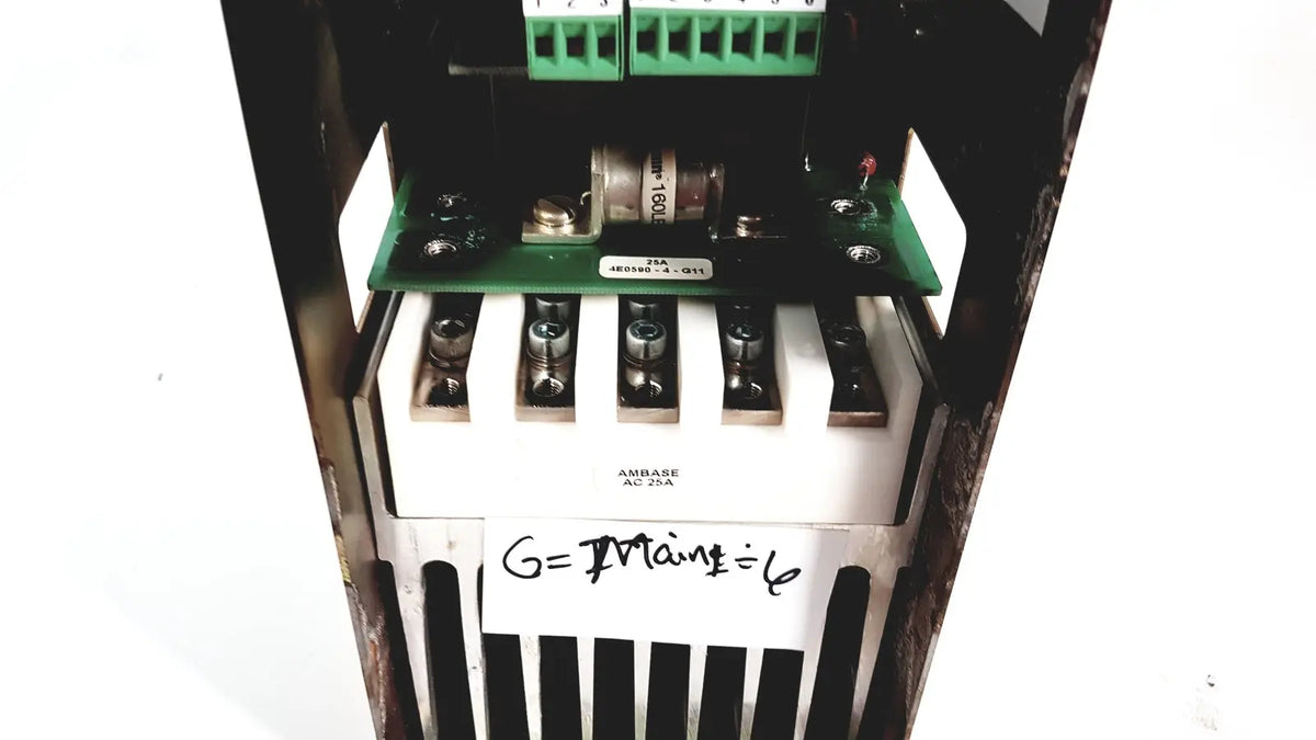 Black metal electrical enclosure housing a green circuit board with silver terminals and white blocks in amplifier cno2 25a