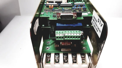 Green circuit board with electronic components inside metallic housing of bystronic amplifier cno2 25a 3000 rpm
