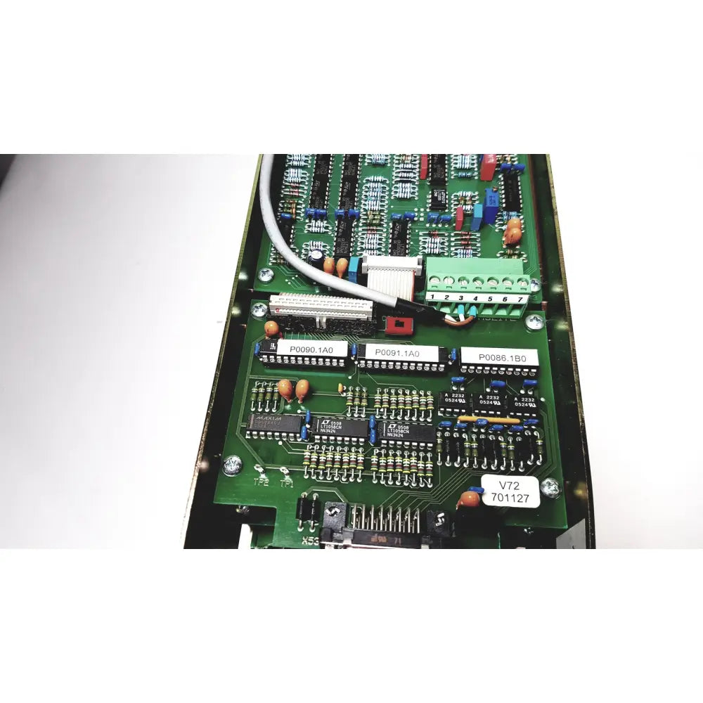 Green printed circuit board of bystronic amplifier cnco2 50a with labeled connectors and electronic components