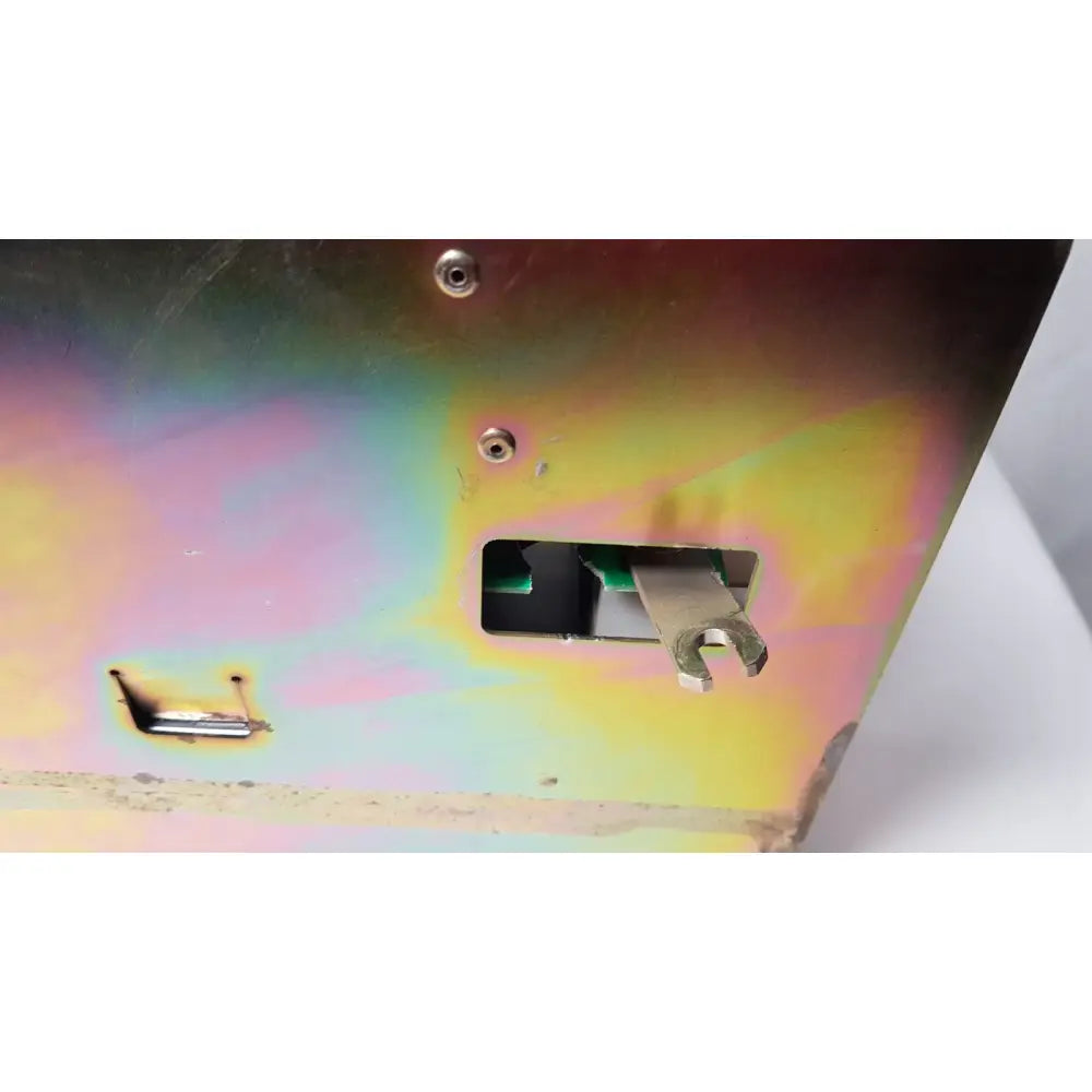 Rainbow-colored metallic arcade machine coin slot with lever on amplifier cnco2 50a model by bystronic
