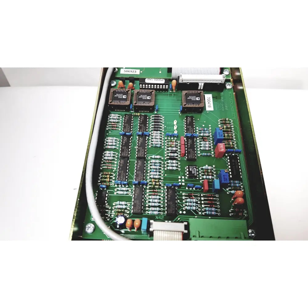 Green printed circuit board of bystronic amplifier cnco2 50a with black integrated circuits and connectors